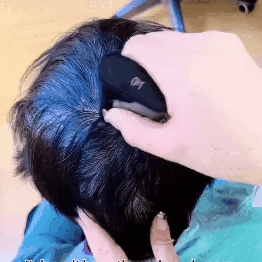 Applying Instant Hair Dye Combo Stick on hair roots